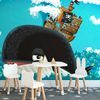 Samolepiaca tapeta plávajúca veľryba s pirátskou loďou