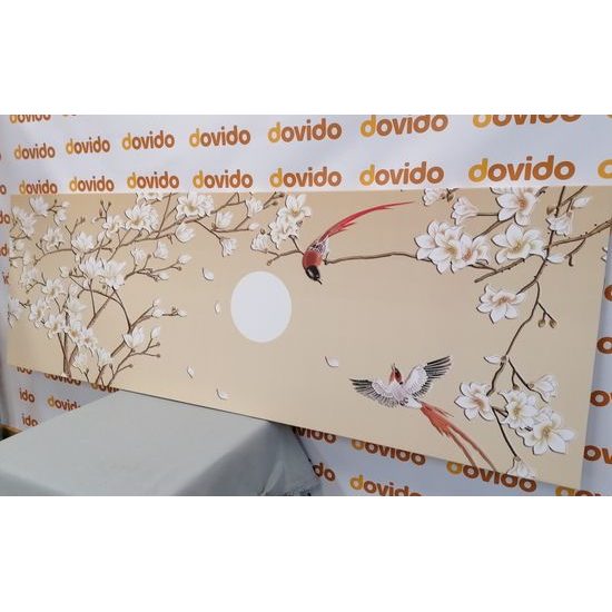 Obraz lietajúce vtáčiky medzi konármi stromov