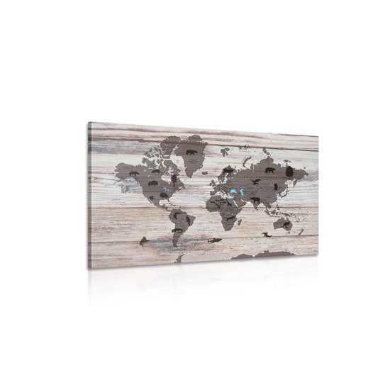 Obraz mapa sveta so symbolickými zvieratami na drevenom podklade