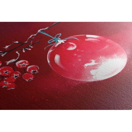 Obraz krásna vianočná guľa na červenom pozadí