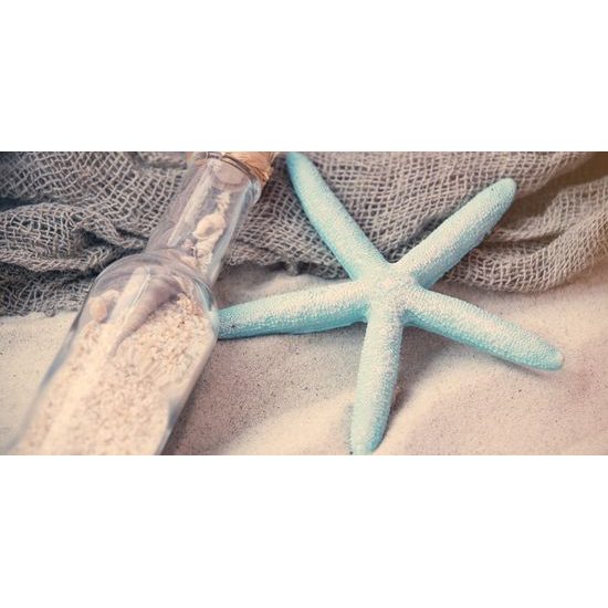 Obraz sklenená flaša na pláži