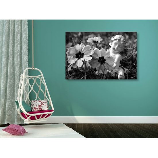 Obraz anjel na rozkvitnutej lúke v čiernobielom prevedení