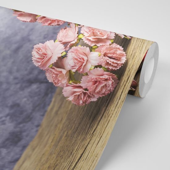 Samolepiaca fototapeta košík s elegantnými ružovými karafiátmi