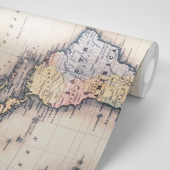 Samolepiaca tapeta lupa na starej mape sveta