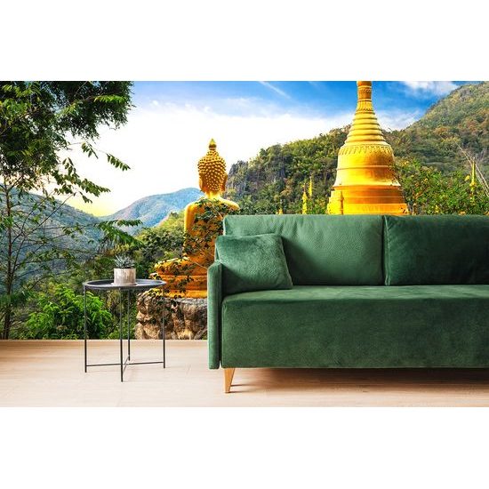 Tapeta zlatý Budha obklopený stromami