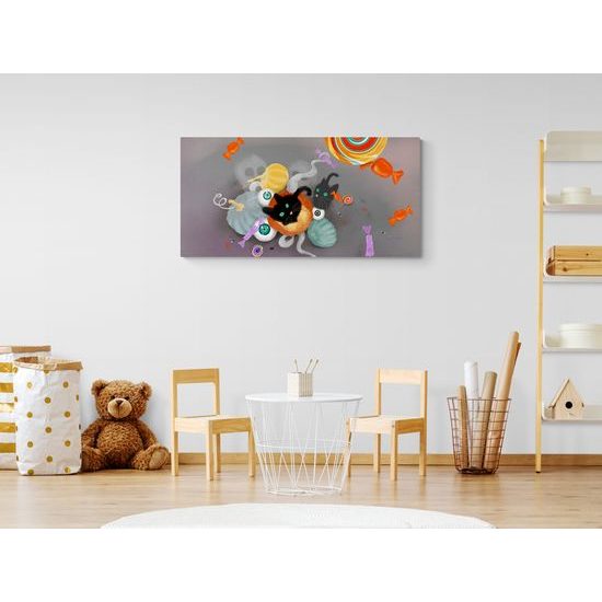 Obraz halloweenske sladkosti s čiernou mačkou