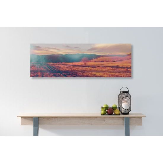 Obraz zapadajúce slnko nad jesennou krajinou