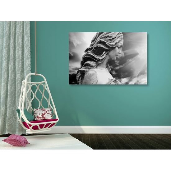 Obraz krásny anjel zaliaty lúčmi slnka v čiernobielom prevedení