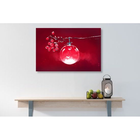 Obraz krásna vianočná guľa na červenom pozadí