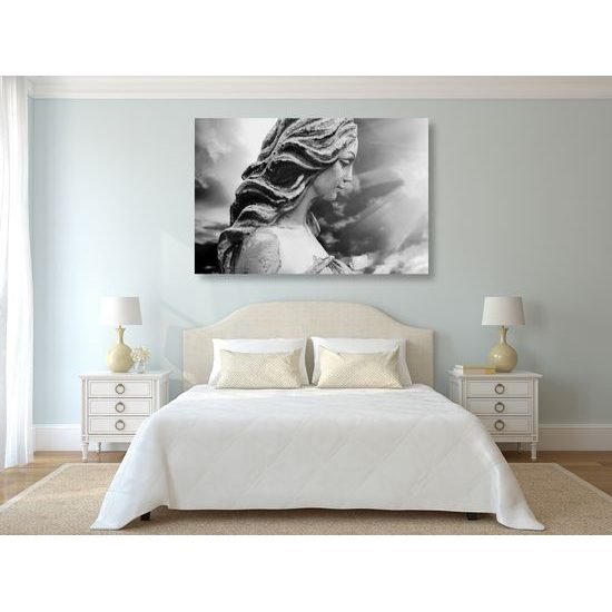 Obraz krásny anjel zaliaty lúčmi slnka v čiernobielom prevedení