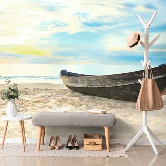 Fototapeta osamelá loďka na pláži
