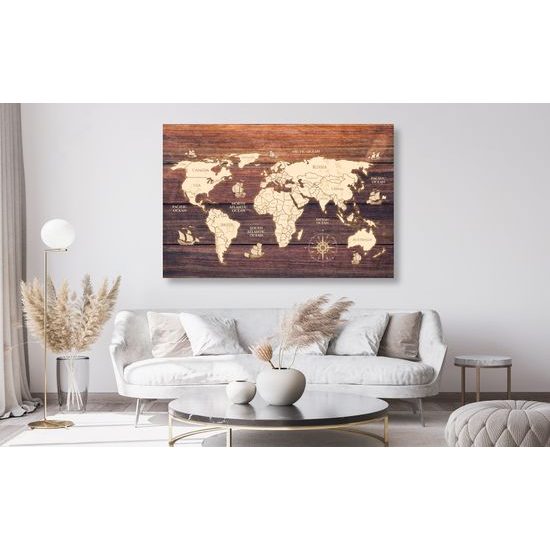 Obraz na korku mapa sveta na drevenom podklade