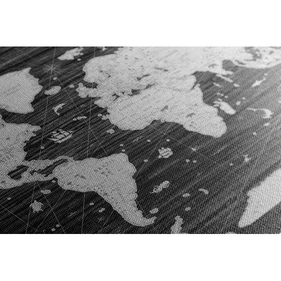 Obraz historická mapa sveta na drevenom pozadí v čiernobielom prevedení