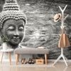 Fototapeta Buddha u dřevěného pozadí v černobílém provedení