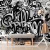 Tapeta stylové graffiti v šedém provedení