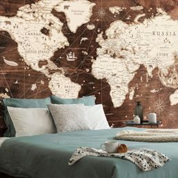 Samolepící tapeta historická mapa světa na dřevěném pozadí