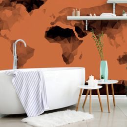 Tapeta mapa světa tvořená mnohoúhelníky v oranžovém provedení