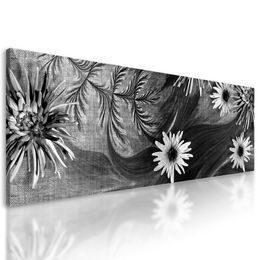 Obraz nádherné květiny s tajemným pozadím v černobílém provedení