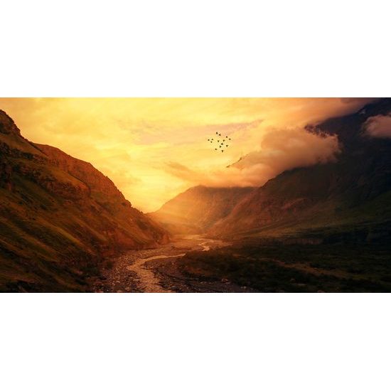 Obraz slunce zapadající za kopce