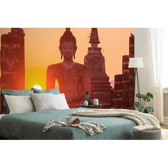 Fototapeta socha Buddhy při východu slunce