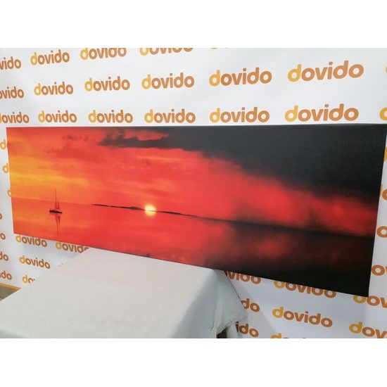 Obraz loďka a nádherný západ slunce