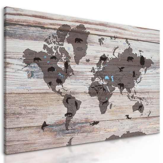 Obraz mapa světa se symbolickými zvířaty na dřevěném podkladu
