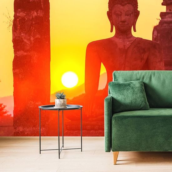 Fototapeta socha Buddhy při východu slunce