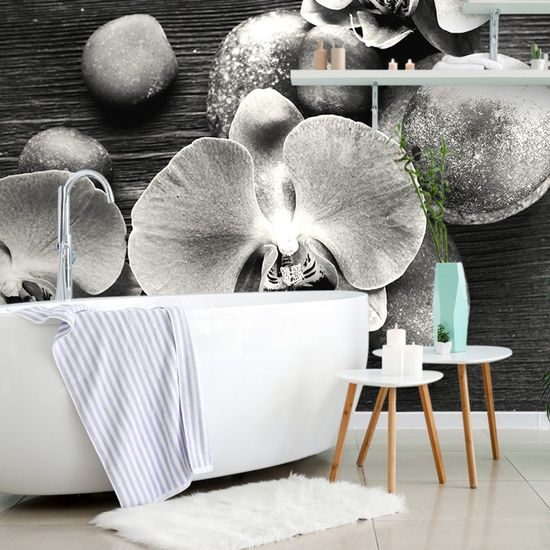 Fototapeta orchidej na zen kamenech v černobílém provedení