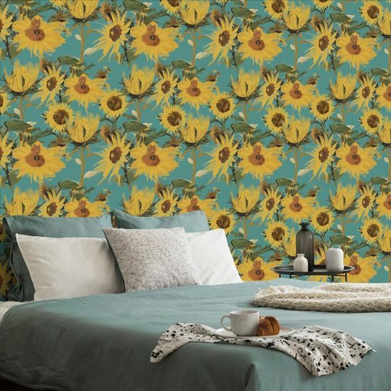 Tapeta rozkvetlé slunečnice na modrém pozadí