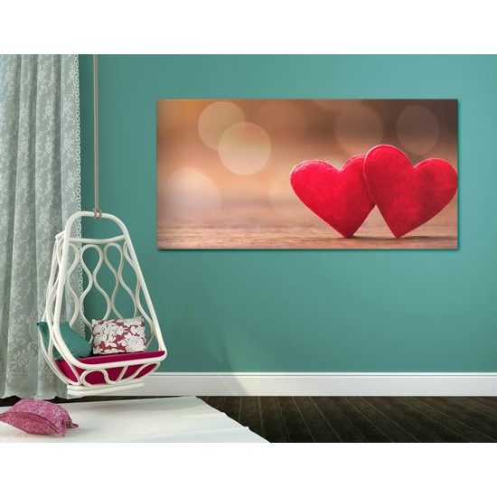 Obraz symboly lásky na zajímavé textuře