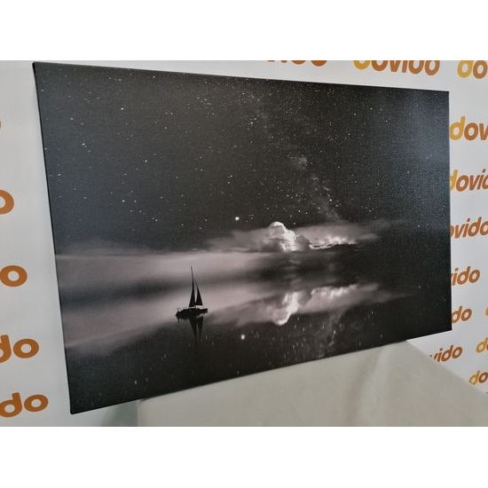 Obraz loďka pod ruškem tmy v černobílém provedení