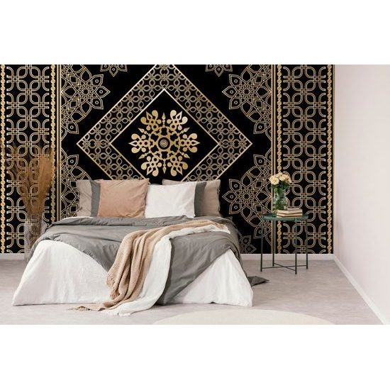 Tapeta nádherný zlatý ornament na černém pozadí