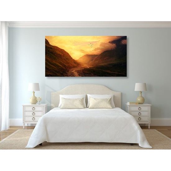 Obraz slunce zapadající za kopce