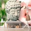 Öntapadó fotótapéta Buddha szobor virágok közelében
