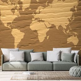 Tapéta barna térkép egy fából készült háttéren