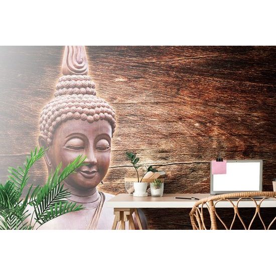 Fotótapeta Buddha egy fából készült háttéren