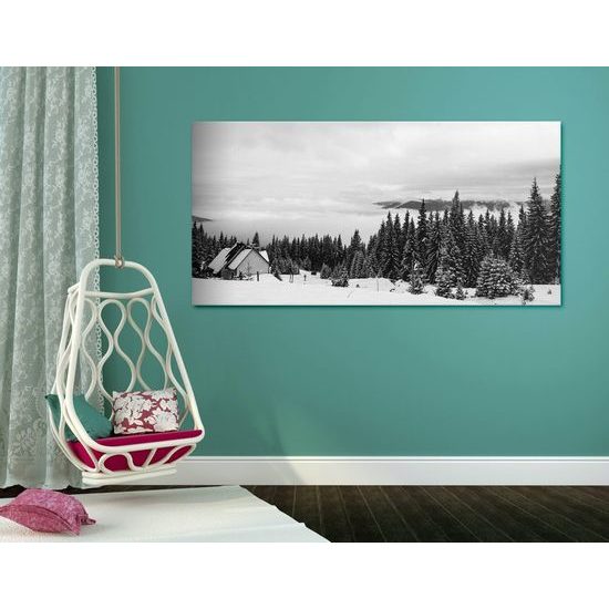 Kép házikó a havas táj közepén fekete-fehér kivitelben