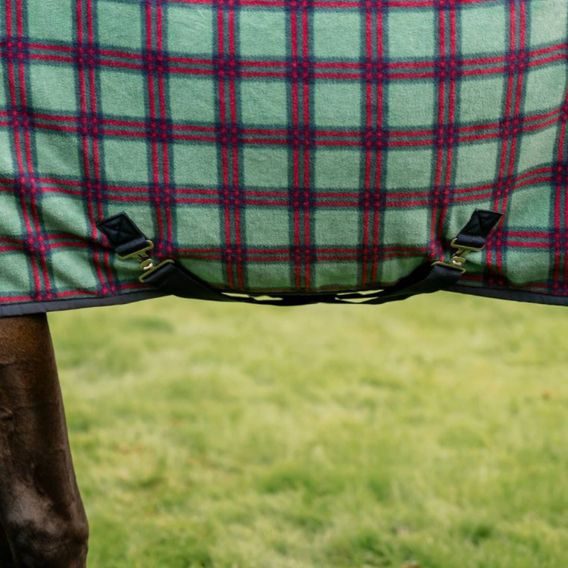 Deka odpocovací Horseware Rhino Fleece Cooler Christmas Collection