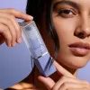 Womanizer Beauty - вибратор за клитор с въздушни вълни във форма на червило (лилав)