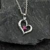 Elegant Heart with Ruby and Zircons Silver pendant