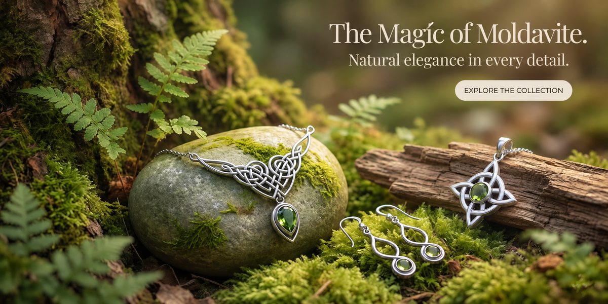 Celtic-inspired sterling silver moldavite jewelry collection featuring a necklace, earrings and pendant in a mystical forest setting