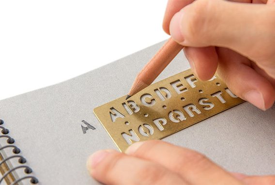Modèle de dessin en laiton et signet avec lettres TRAVELER'S COMPANY BRASS PRODUCTS