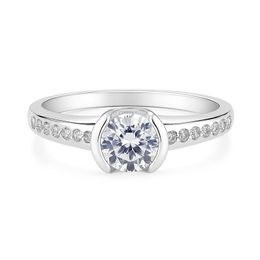 Zlatý prsten z bílého zlata se zirkony