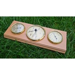 Barometr s teploměrem a vlhkoměrem na dřevěné podložce B203228