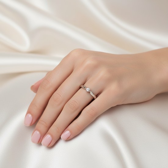 Zlatý 585/1000 prsten z bílého zlata s briliantem 386.1817 0,04ct