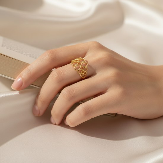 Zlatý 585/1000 prsten proplétaný TU-5012