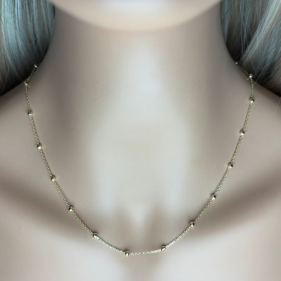 Zlatý náhrdelník s broušenými kuličkami