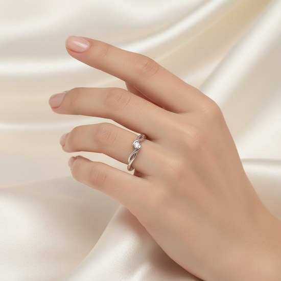 Zlatý 585/1000 prsten z bílého zlata s briliantem 386.0702 0,04ct