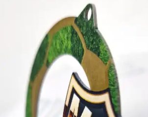 Revolutionising Award Design: The Story Behind Our New 1.5mm Thickness Medal