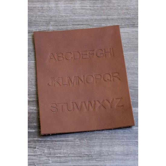 Modré šle Y s koženým středem a zapínáním na klipy - plastické čárky